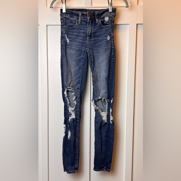 American Eagle Next Level Stretch Jegging Women Size 00 R Distressed Medium Wash - Picture 1 of 10